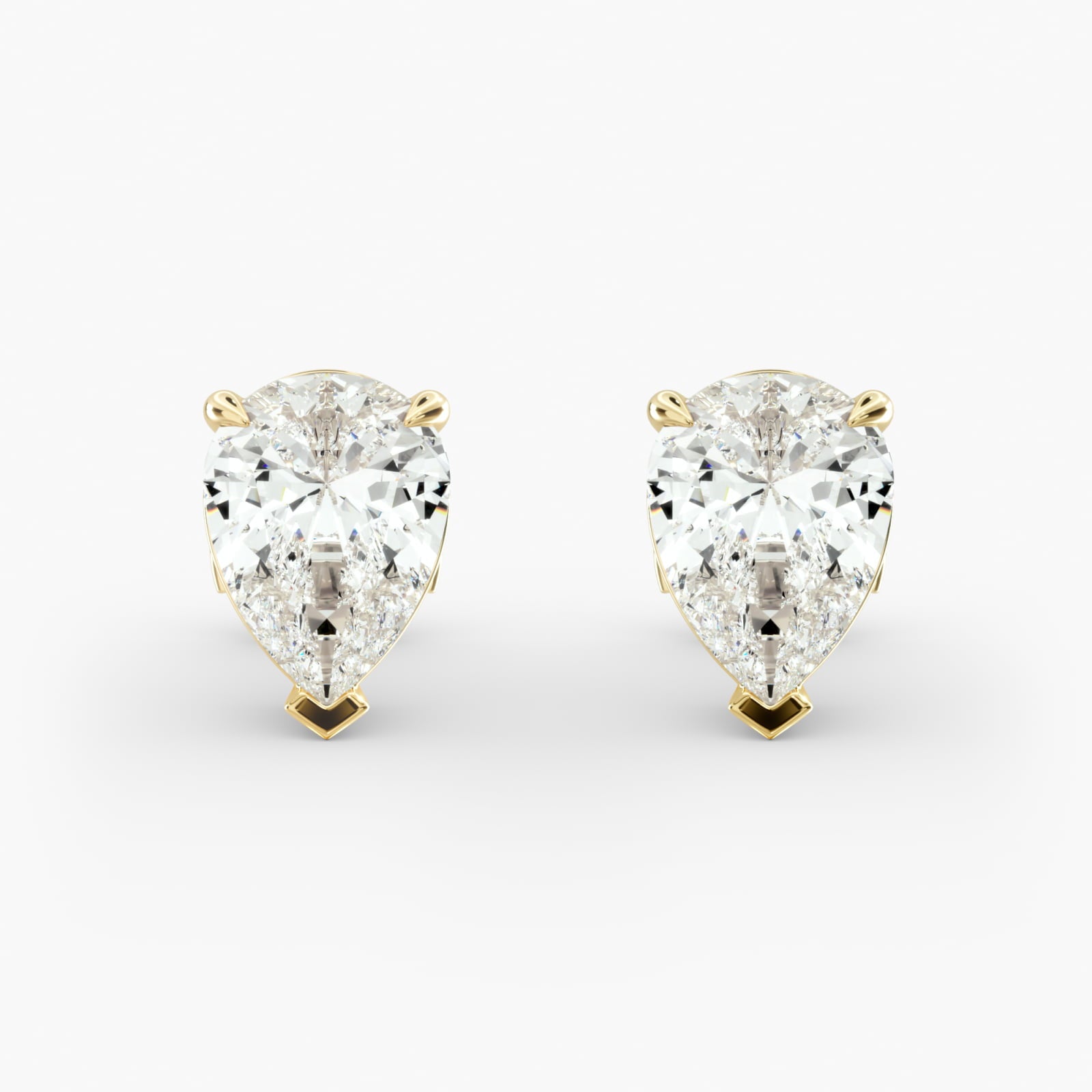 Pear Shape Custom Diamond Stud Earrings Shown in 2 ct. Total